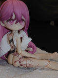 Tattooed articulated doll
